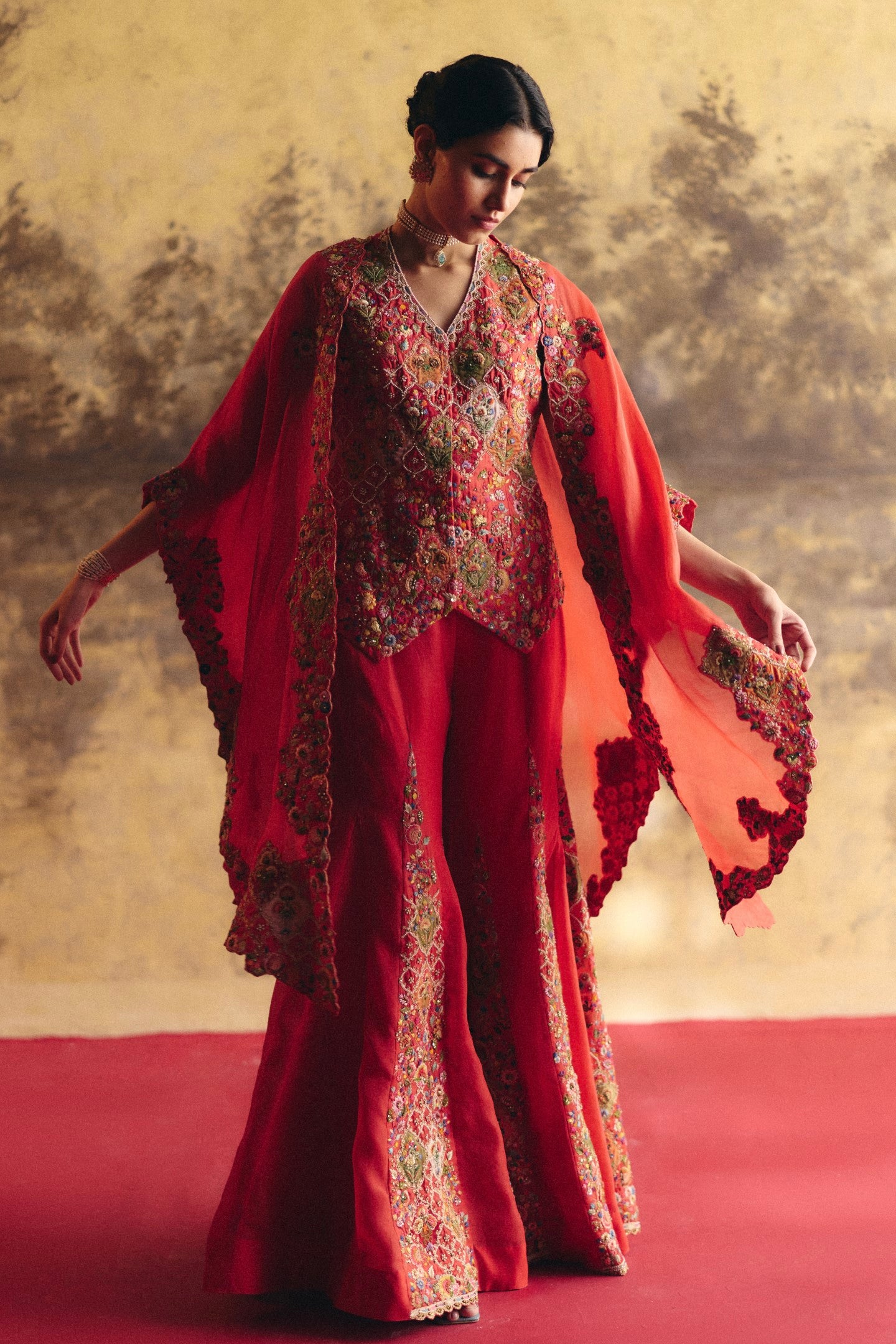 Short jacket with cape  and gusset sharara