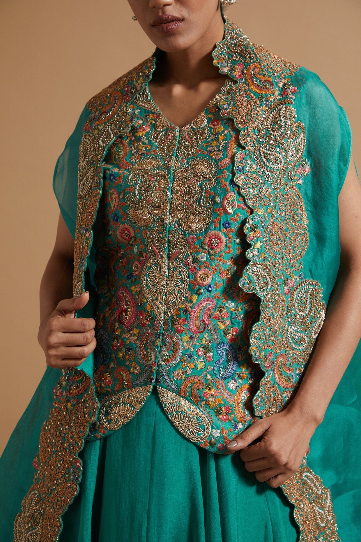 Short Jacket With Skirt And Cape